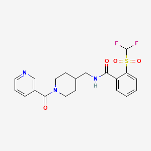 molecular formula C20H21F2N3O4S B2823139 2-((二氟甲基)磺酰基)-N-((1-烟酰基哌啶-4-基)甲基)苯甲酰胺 CAS No. 1797802-10-8