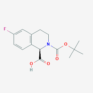 (1R)-2-[(tert-butoxy)carbonyl]-6-fluoro-1,2,3,4-tetrahydroisoquinoline-1-carboxylic acid