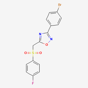 molecular formula C15H10BrFN2O3S B2823772 3-(4-Bromophenyl)-5-(((4-fluorophenyl)sulfonyl)methyl)-1,2,4-oxadiazole CAS No. 1105224-14-3