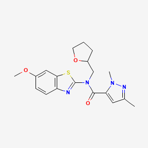 molecular formula C19H22N4O3S B2823921 N-(6-methoxybenzo[d]thiazol-2-yl)-1,3-dimethyl-N-((tetrahydrofuran-2-yl)methyl)-1H-pyrazole-5-carboxamide CAS No. 1013796-81-0
