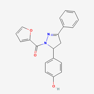 molecular formula C20H16N2O3 B2824748 furan-2-yl(5-(4-hydroxyphenyl)-3-phenyl-4,5-dihydro-1H-pyrazol-1-yl)methanone CAS No. 868146-48-9