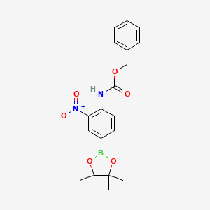 molecular formula C20H23BN2O6 B2824932 4-(CBZ-氨基)-3-硝基苯硼酸脱水醇酯 CAS No. 2377609-53-3