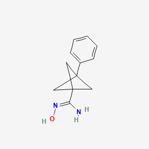 molecular formula C12H14N2O B2827557 N-Hydroxy-3-phenylbicyclo[1.1.1]pentane-1-carboximidamide CAS No. 2225136-44-5