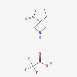 molecular formula C9H12F3NO3 B2829348 2-氮杂螺[3.4]辛酮;2,2,2-三氟乙酸 CAS No. 2551118-50-2