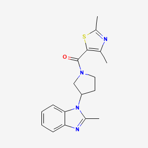 molecular formula C18H20N4OS B2829569 (2,4-二甲基噻唑-5-基)(3-(2-甲基-1H-苯并[d]咪唑-1-基)吡咯啉-1-基)甲酮 CAS No. 2034514-70-8