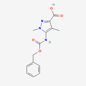 molecular formula C14H15N3O4 B2830323 1,4-Dimethyl-5-(phenylmethoxycarbonylamino)pyrazole-3-carboxylic acid CAS No. 2248373-35-3