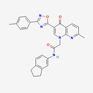 molecular formula C29H25N5O3 B2831428 N-(2,3-dihydro-1H-inden-5-yl)-2-(7-methyl-4-oxo-3-(3-(p-tolyl)-1,2,4-oxadiazol-5-yl)-1,8-naphthyridin-1(4H)-yl)acetamide CAS No. 1032002-40-6