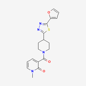 molecular formula C18H18N4O3S B2832139 3-(4-(5-(呋喃-2-基)-1,3,4-噻二唑-2-基)哌啶-1-甲酰基)-1-甲基吡啶-2(1H)-酮 CAS No. 1226457-36-8