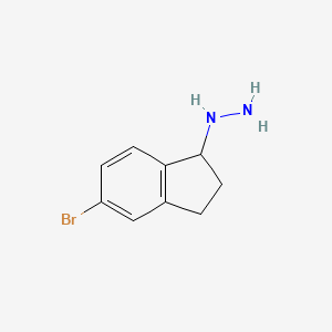 (5-Bromo-2,3-dihydro-1H-inden-1-yl)hydrazine