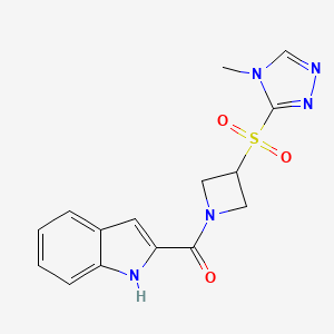 molecular formula C15H15N5O3S B2833197 (1H-吲哚-2-基)(3-((4-甲基-4H-1,2,4-三唑-3-基)磺酰)吖唑啉-1-基)甲酮 CAS No. 2034488-26-9