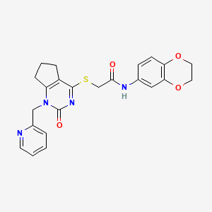 molecular formula C23H22N4O4S B2833259 N-(2,3-二氢苯并[b][1,4]二噁烷-6-基)-2-((2-氧代-1-(吡啶-2-基甲基)-2,5,6,7-四氢-1H-环戊[d]嘧啶-4-基)硫代)乙酰胺 CAS No. 899955-07-8
