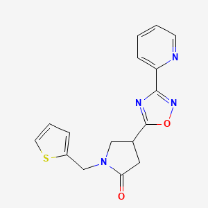 4-(3-(Pyridin-2-yl)-1,2,4-oxadiazol-5-yl)-1-(thiophen-2-ylmethyl)pyrrolidin-2-one