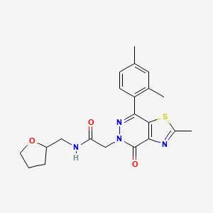 molecular formula C21H24N4O3S B2837209 2-(7-(2,4-dimethylphenyl)-2-methyl-4-oxothiazolo[4,5-d]pyridazin-5(4H)-yl)-N-((tetrahydrofuran-2-yl)methyl)acetamide CAS No. 942004-17-3