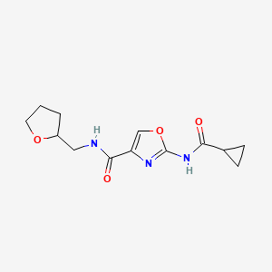 molecular formula C13H17N3O4 B2837888 2-(环丙烷甲酰胺基)-N-((四氢呋喃-2-基)甲基)噁唑-4-甲酰胺 CAS No. 1351618-68-2