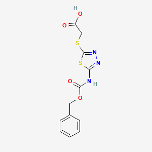 molecular formula C12H11N3O4S2 B2838223 2-[[5-(Phenylmethoxycarbonylamino)-1,3,4-thiadiazol-2-yl]sulfanyl]acetic acid CAS No. 2287272-36-8