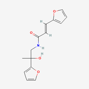 molecular formula C14H15NO4 B2838658 (E)-3-(furan-2-yl)-N-(2-(furan-2-yl)-2-hydroxypropyl)acrylamide CAS No. 1396891-50-1