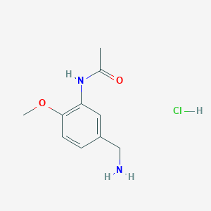 molecular formula C10H15ClN2O2 B2839052 N-(5-氨基甲基-2-甲氧基-苯基)-乙酰胺；盐酸盐 CAS No. 1956318-41-4