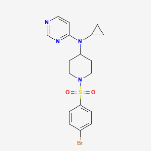 molecular formula C18H21BrN4O2S B2840224 N-[1-(4-Bromophenyl)sulfonylpiperidin-4-yl]-N-cyclopropylpyrimidin-4-amine CAS No. 2380170-29-4