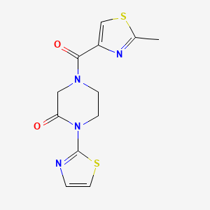 molecular formula C12H12N4O2S2 B2840493 4-(2-Methylthiazole-4-carbonyl)-1-(thiazol-2-yl)piperazin-2-one CAS No. 2320376-12-1