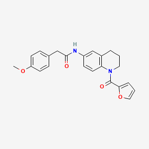 molecular formula C23H22N2O4 B2840947 N-[1-(呋喃-2-甲酰)-3,4-二氢-2H-喹啉-6-基]-2-(4-甲氧基苯基)乙酰胺 CAS No. 946288-82-0