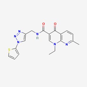molecular formula C19H18N6O2S B2841175 1-乙基-7-甲基-4-氧代-N-((1-(噻吩-2-基)-1H-1,2,3-三唑-4-基)甲基)-1,4-二氢-1,8-萘啉-3-羧酰胺 CAS No. 2034560-78-4
