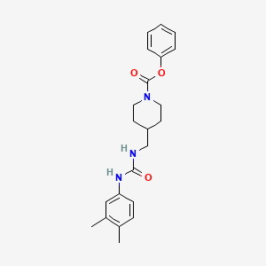 molecular formula C22H27N3O3 B2841303 Phenyl 4-((3-(3,4-dimethylphenyl)ureido)methyl)piperidine-1-carboxylate CAS No. 1235322-37-8