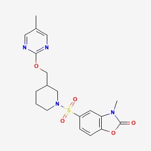 molecular formula C19H22N4O5S B2841498 3-Methyl-5-[3-[(5-methylpyrimidin-2-yl)oxymethyl]piperidin-1-yl]sulfonyl-1,3-benzoxazol-2-one CAS No. 2380034-28-4