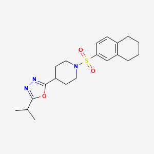 molecular formula C20H27N3O3S B2844064 2-Isopropyl-5-(1-((5,6,7,8-tetrahydronaphthalen-2-yl)sulfonyl)piperidin-4-yl)-1,3,4-oxadiazole CAS No. 1210190-13-8