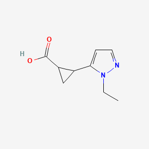 molecular formula C9H12N2O2 B2844672 2-(1-乙基-1H-吡唑-5-基)环丙烷-1-羧酸 CAS No. 1599083-83-6