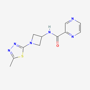 molecular formula C11H12N6OS B2848318 N-[1-(5-Methyl-1,3,4-thiadiazol-2-yl)azetidin-3-yl]pyrazine-2-carboxamide CAS No. 2415514-09-7