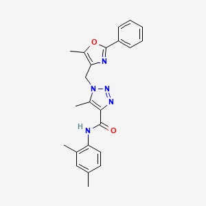 molecular formula C23H23N5O2 B2850601 N-(2,4-dimethylphenyl)-5-methyl-1-[(5-methyl-2-phenyl-1,3-oxazol-4-yl)methyl]-1H-1,2,3-triazole-4-carboxamide CAS No. 941898-82-4