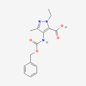 molecular formula C15H17N3O4 B2851444 2-Ethyl-5-methyl-4-(phenylmethoxycarbonylamino)pyrazole-3-carboxylic acid CAS No. 2287301-84-0