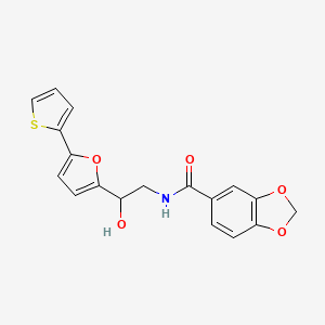 molecular formula C18H15NO5S B2852679 N-[2-Hydroxy-2-(5-thiophen-2-ylfuran-2-yl)ethyl]-1,3-benzodioxole-5-carboxamide CAS No. 2319717-39-8