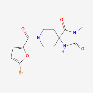 8-(5-Bromofuran-2-carbonyl)-3-methyl-1,3,8-triazaspiro[4.5]decane-2,4-dione