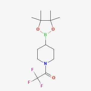 molecular formula C13H21BF3NO3 B2853254 2,2,2-Trifluoro-1-[4-(tetramethyl-1,3,2-dioxaborolan-2-yl)piperidin-1-yl]ethanone CAS No. 2377611-55-5