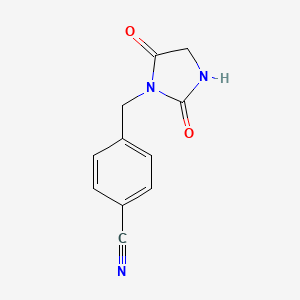 molecular formula C11H9N3O2 B2853447 4-[(2,5-Dioxoimidazolidin-1-yl)methyl]benzonitrile CAS No. 565174-36-9
