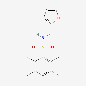 molecular formula C15H19NO3S B2854089 N-(furan-2-ylmethyl)-2,3,5,6-tetramethylbenzenesulfonamide CAS No. 496013-65-1
