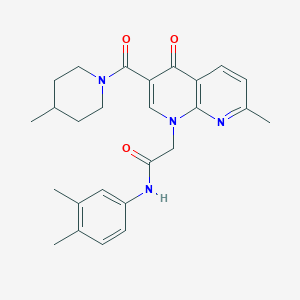 N-(3,4-dimethylphenyl)-2-(7-methyl-3-(4-methylpiperidine-1-carbonyl)-4-oxo-1,8-naphthyridin-1(4H)-yl)acetamide