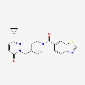 molecular formula C21H22N4O2S B2855873 2-{[1-(1,3-Benzothiazole-6-carbonyl)piperidin-4-yl]methyl}-6-cyclopropyl-2,3-dihydropyridazin-3-one CAS No. 2097933-69-0