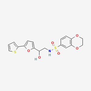 molecular formula C18H17NO6S2 B2856234 N-[2-Hydroxy-2-(5-thiophen-2-ylfuran-2-yl)ethyl]-2,3-dihydro-1,4-benzodioxine-6-sulfonamide CAS No. 2319853-47-7
