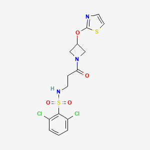 molecular formula C15H15Cl2N3O4S2 B2857761 2,6-dichloro-N-(3-oxo-3-(3-(thiazol-2-yloxy)azetidin-1-yl)propyl)benzenesulfonamide CAS No. 1797741-78-6
