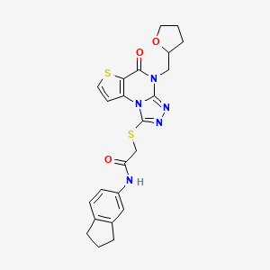 molecular formula C23H23N5O3S2 B2858054 N-(2,3-dihydro-1H-inden-5-yl)-2-((5-oxo-4-((tetrahydrofuran-2-yl)methyl)-4,5-dihydrothieno[2,3-e][1,2,4]triazolo[4,3-a]pyrimidin-1-yl)thio)acetamide CAS No. 1189945-89-8