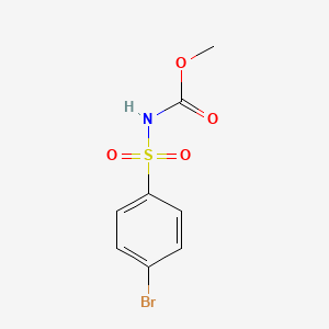 molecular formula C8H8BrNO4S B2858139 N-[(4-bromophenyl)sulfonyl]carbamic acid methyl ester CAS No. 7018-75-9