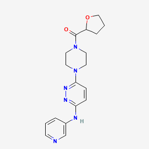 molecular formula C18H22N6O2 B2859056 (4-(6-(吡啶-3-基氨基)哒嗪-3-基)哌嗪-1-基)(四氢呋喃-2-基)甲甲酮 CAS No. 1226433-37-9