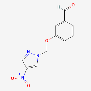 molecular formula C11H9N3O4 B2859085 3-[(4-nitro-1H-pyrazol-1-yl)methoxy]benzaldehyde CAS No. 1006436-08-3