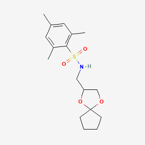N-(1,4-dioxaspiro[4.4]nonan-2-ylmethyl)-2,4,6-trimethylbenzenesulfonamide