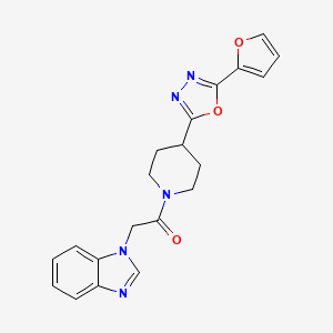 molecular formula C20H19N5O3 B2859532 2-(1H-benzo[d]imidazol-1-yl)-1-(4-(5-(furan-2-yl)-1,3,4-oxadiazol-2-yl)piperidin-1-yl)ethanone CAS No. 1210295-20-7