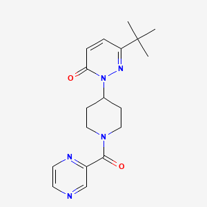 molecular formula C18H23N5O2 B2859825 6-Tert-butyl-2-[1-(pyrazine-2-carbonyl)piperidin-4-yl]pyridazin-3-one CAS No. 2320147-51-9