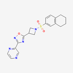 molecular formula C19H19N5O3S B2860636 3-(Pyrazin-2-yl)-5-(1-((5,6,7,8-tetrahydronaphthalen-2-yl)sulfonyl)azetidin-3-yl)-1,2,4-oxadiazole CAS No. 1331269-59-0