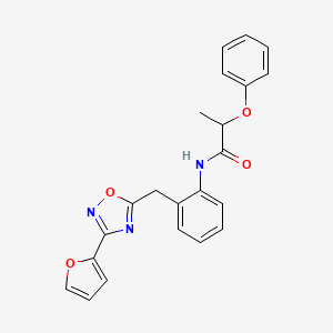 molecular formula C22H19N3O4 B2860809 N-(2-((3-(furan-2-yl)-1,2,4-oxadiazol-5-yl)methyl)phenyl)-2-phenoxypropanamide CAS No. 1797603-13-4